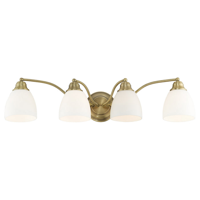 Four Light Bath Vanity from the Somerville collection in Antique Brass finish