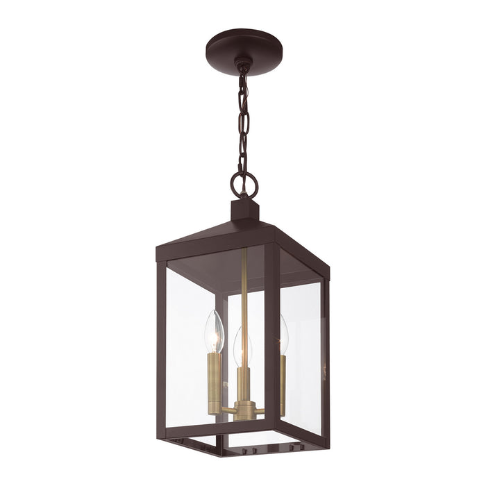 Three Light Outdoor Pendant from the Nyack collection in Bronze with Antique Brass Cluser finish
