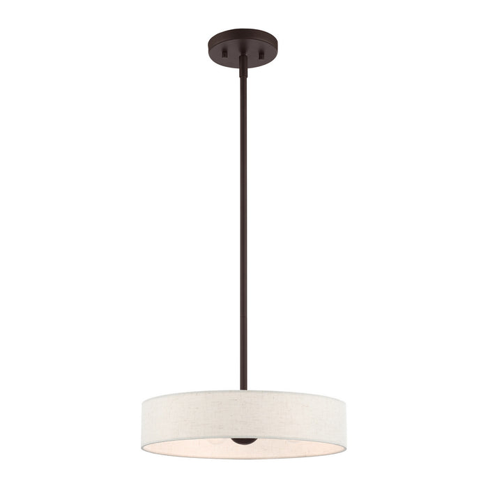 Four Light Pendant from the Venlo collection in Bronze with Antique Brass Accents finish