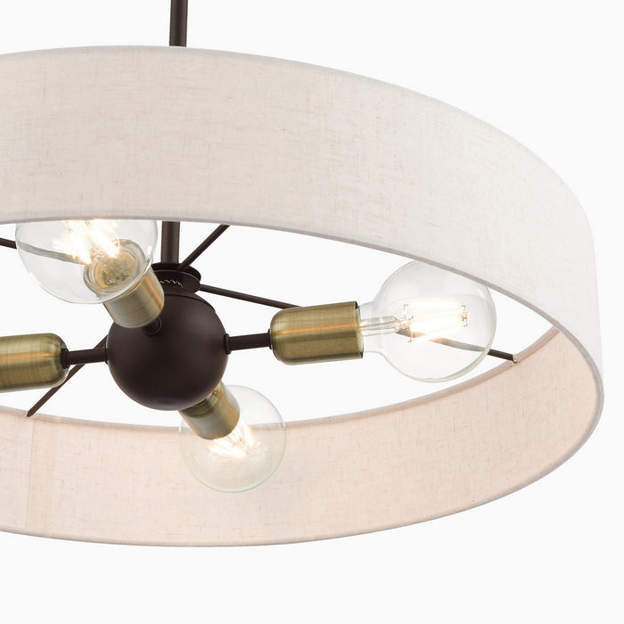 Four Light Pendant from the Venlo collection in Bronze with Antique Brass Accents finish