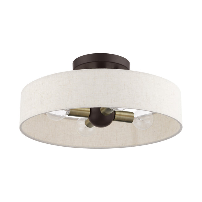 Four Light Semi Flush Mount from the Venlo collection in Bronze with Antique Brass Accents finish
