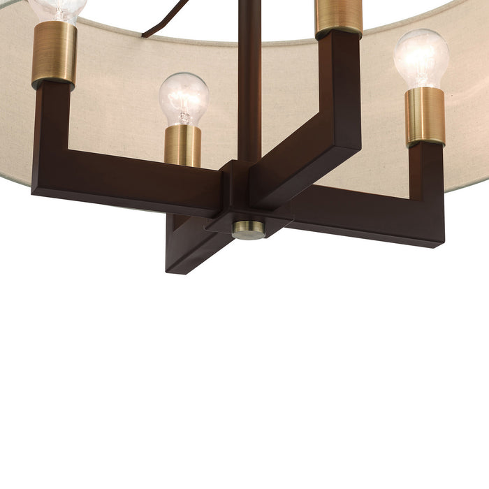 Four Light Chandelier from the Cresthaven collection in Bronze with Antique Brass Accents finish