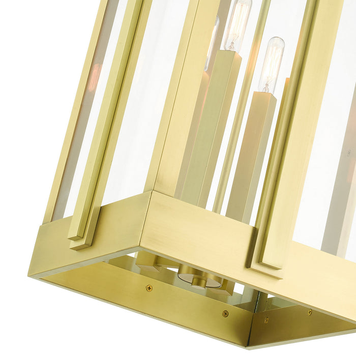 Four Light Outdoor Pendant from the Lexington collection in Natural Brass finish
