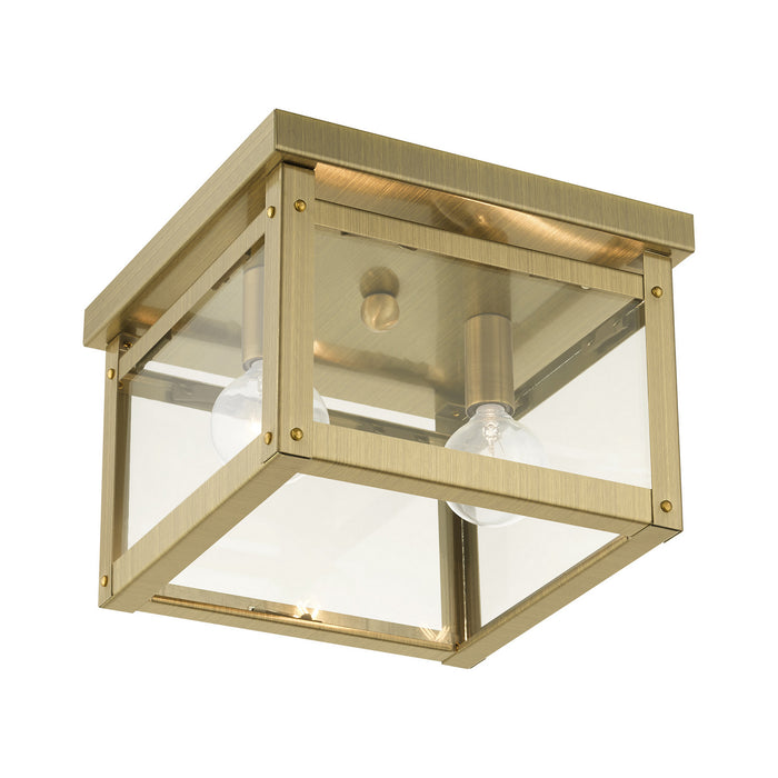 Two Light Flush Mount from the Milford collection in Antique Brass finish