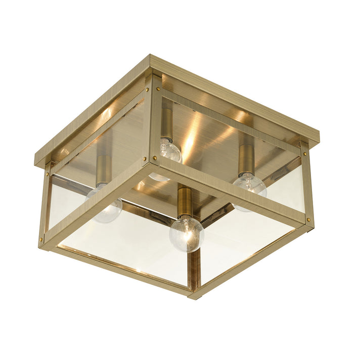 Four Light Flush Mount from the Milford collection in Antique Brass finish