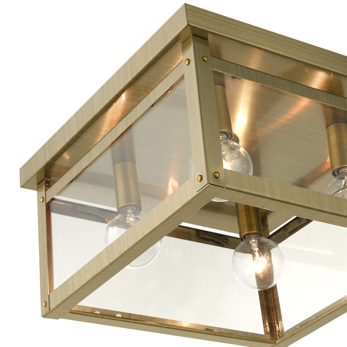 Four Light Flush Mount from the Milford collection in Antique Brass finish