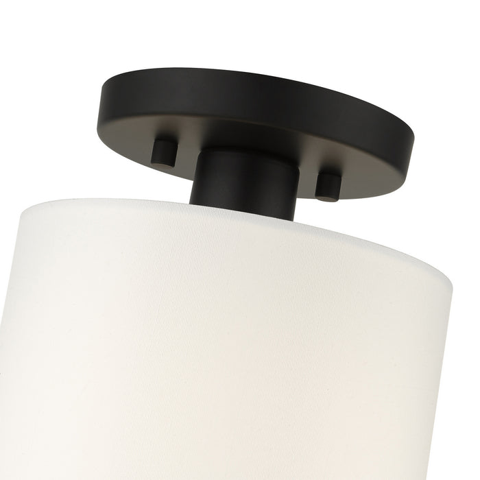 One Light Semi Flush Mount from the Meridian collection in Black finish