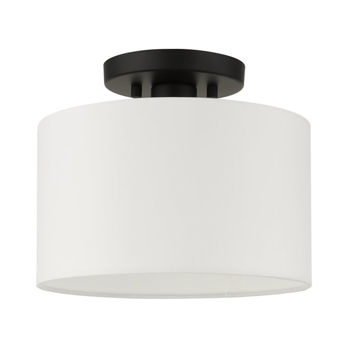 One Light Semi Flush Mount from the Meridian collection in Black finish