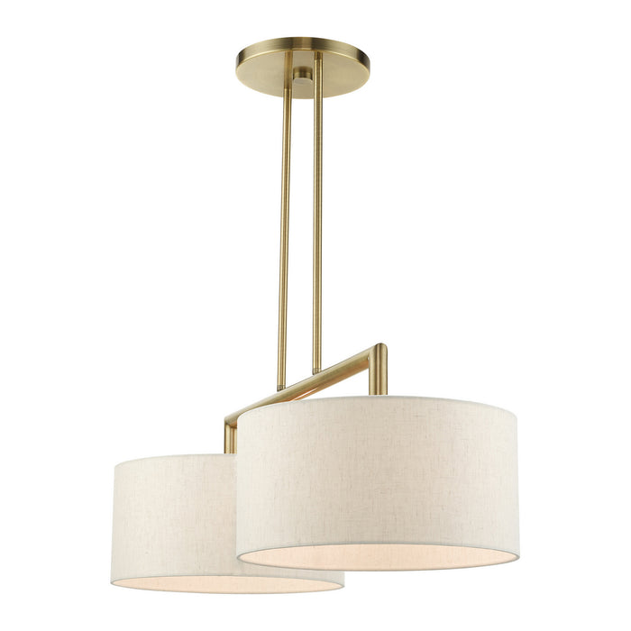 Two Light Linear Chandelier from the Meridian collection in Antique Brass finish