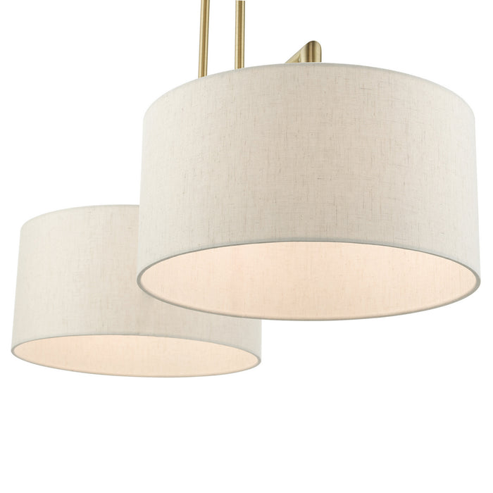 Two Light Linear Chandelier from the Meridian collection in Antique Brass finish