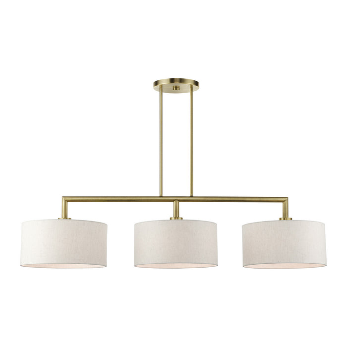 Three Light Linear Chandelier from the Meridian collection in Antique Brass finish