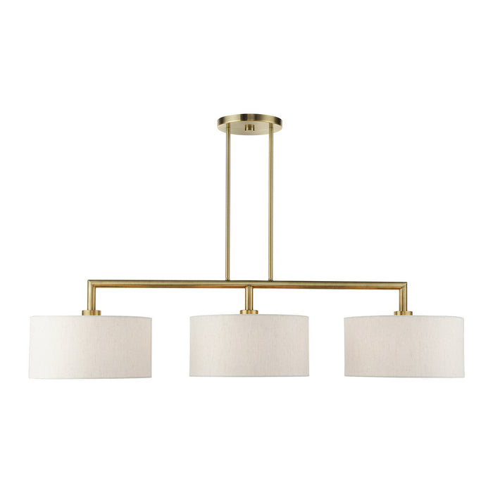 Three Light Linear Chandelier from the Meridian collection in Antique Brass finish