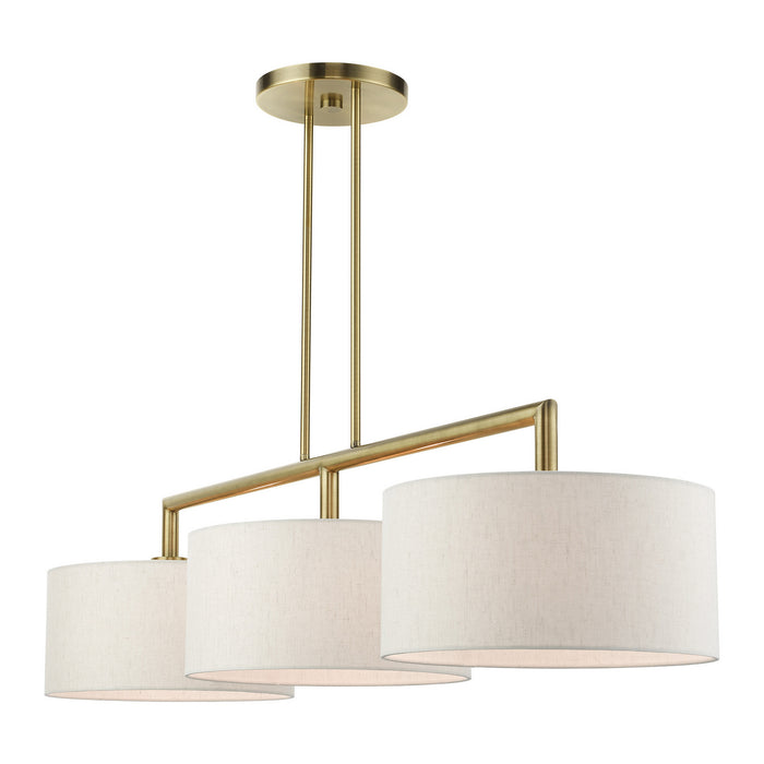 Three Light Linear Chandelier from the Meridian collection in Antique Brass finish