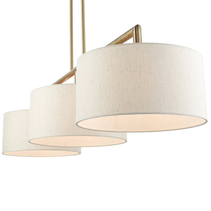 Three Light Linear Chandelier from the Meridian collection in Antique Brass finish