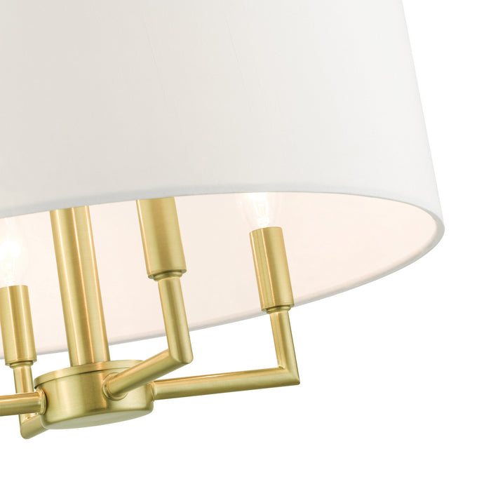 Four Light Chandelier from the Meridian collection in Satin Brass finish