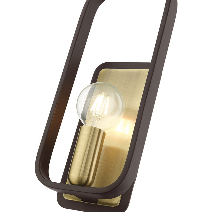 One Light Wall Sconce from the Bergamo collection in Bronze with Antique Brass finish