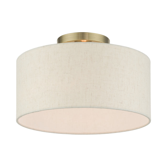 One Light Semi Flush Mount from the Blossom collection in Antique Brass finish